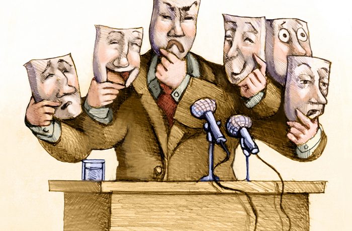 a politician speaks to the public with a set of masks